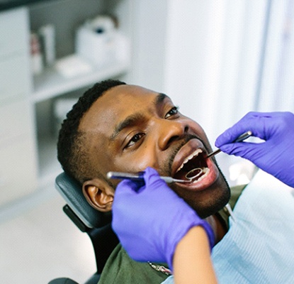 man getting a dental checkup