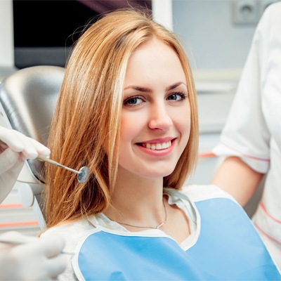 A young woman in the dentist chair