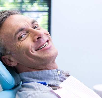 Man with dentures in East York smiling