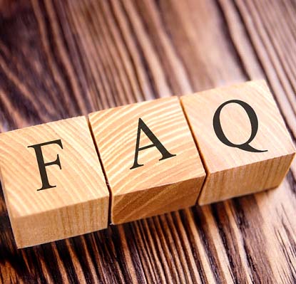 Wooden letter blocks spelling out FAQ