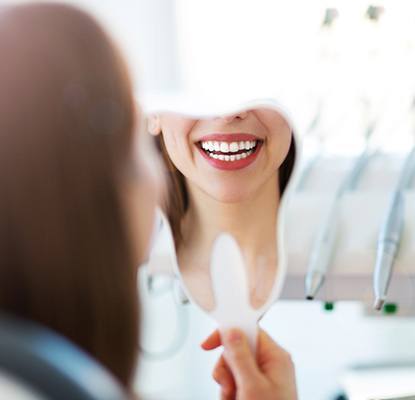 a patient brushing their teeth