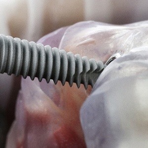 a closeup of dental implant surgery