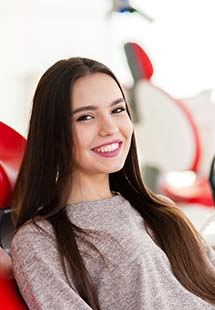 woman smiling in dental chair