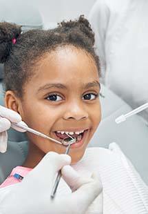 child getting a dental exam