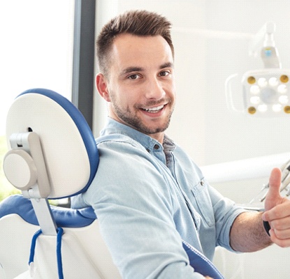 Dental patient thumbs up