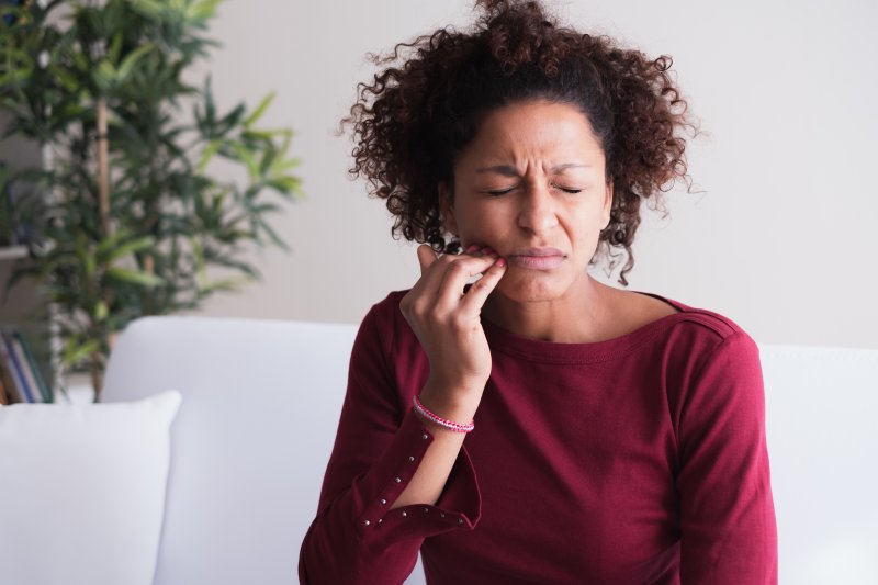 Woman with tooth sensitivity